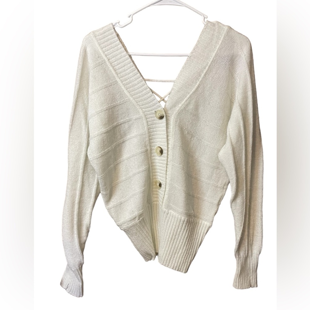 NWOT long sleeve button down front with open lace up back oversized.